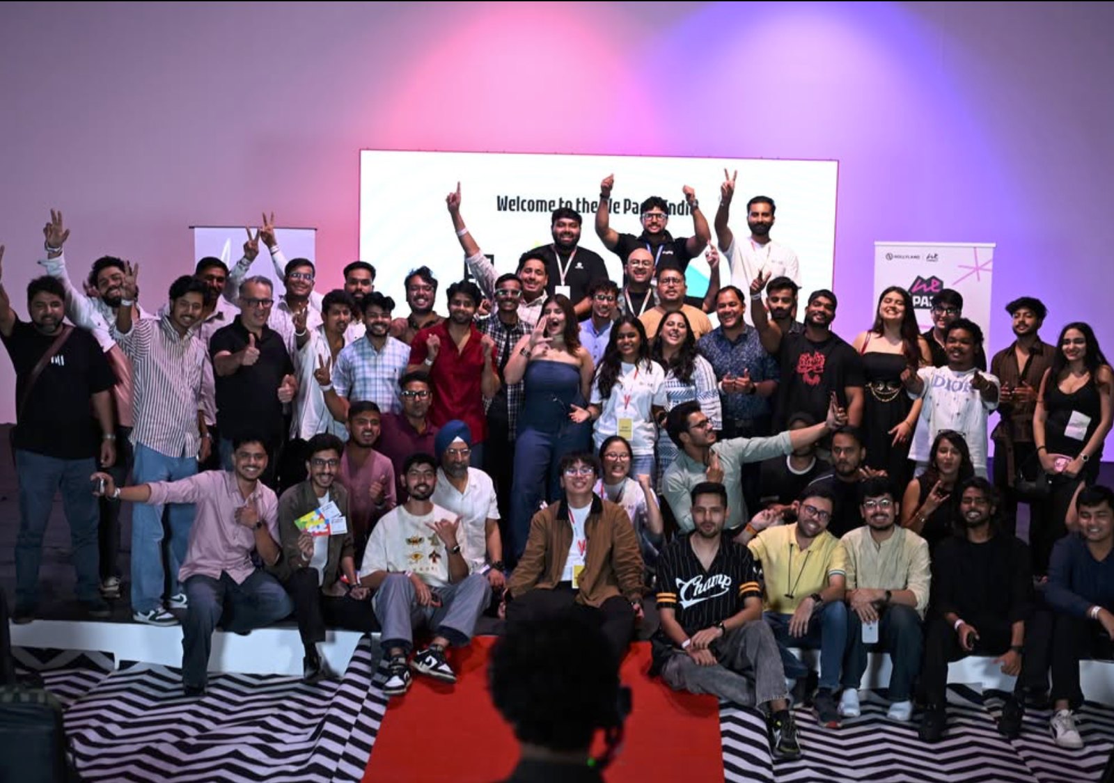Group photo of everyone on stage at the end of the event