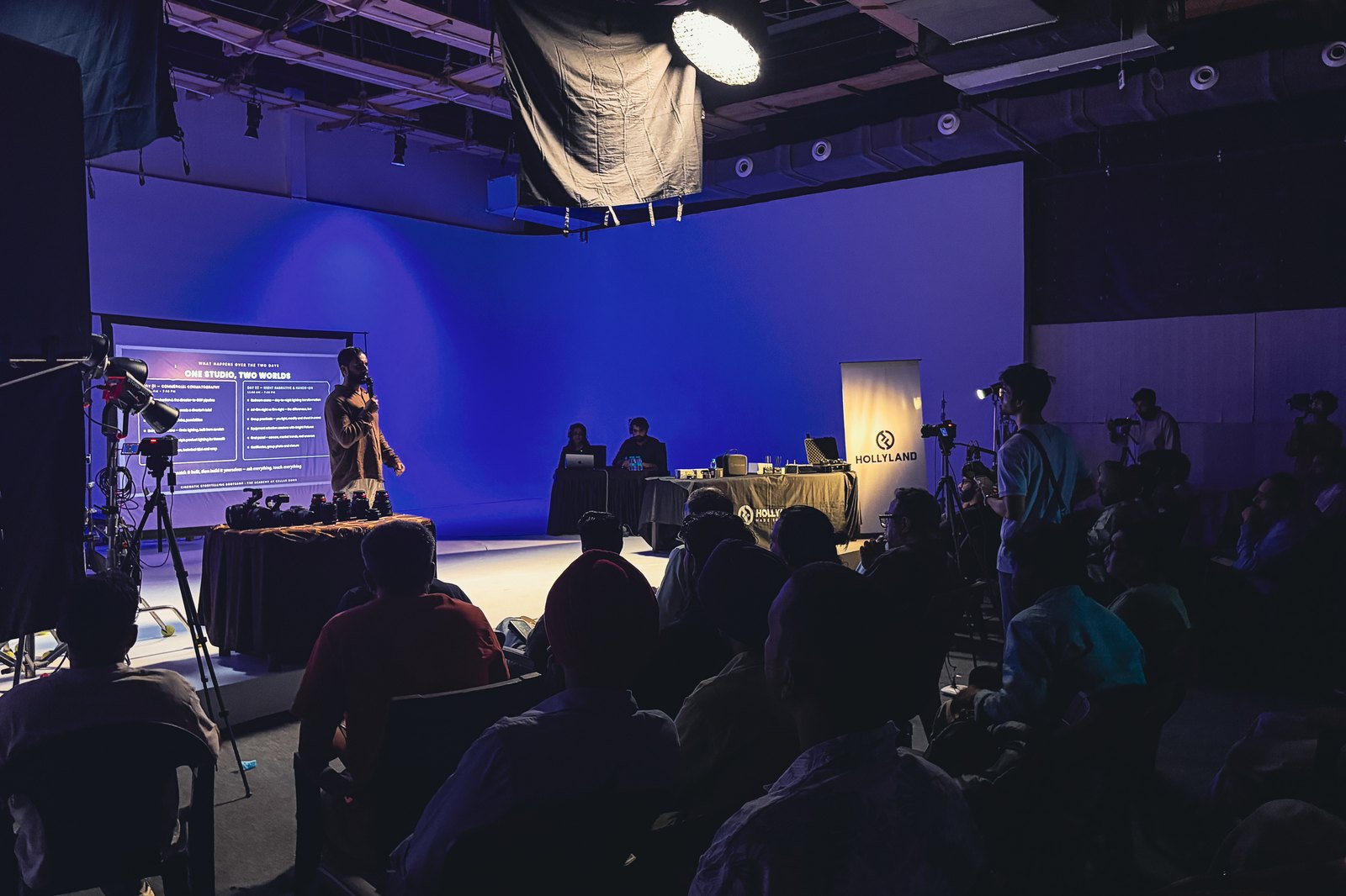 A cinematic storytelling bootcamp session running on the cyclorama floor