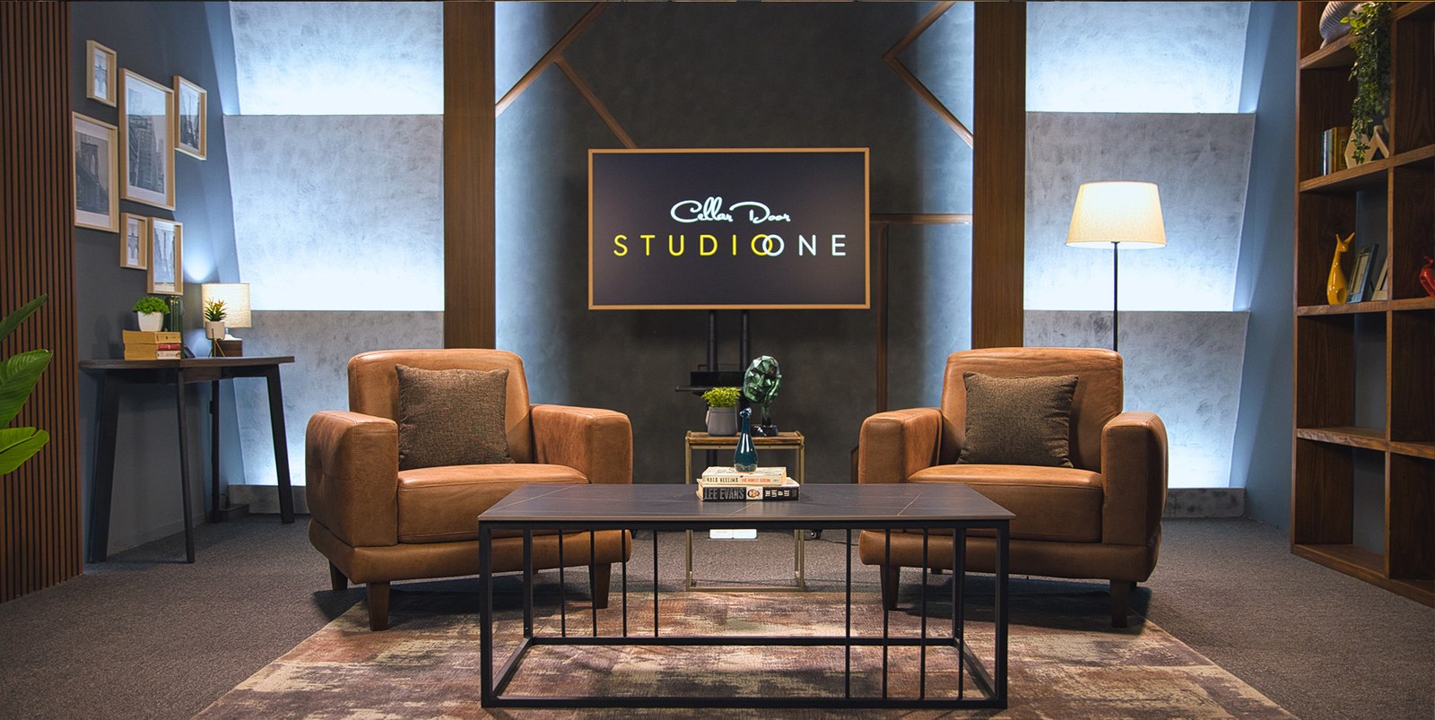 Two-chair setup at Studio One with the branded screen