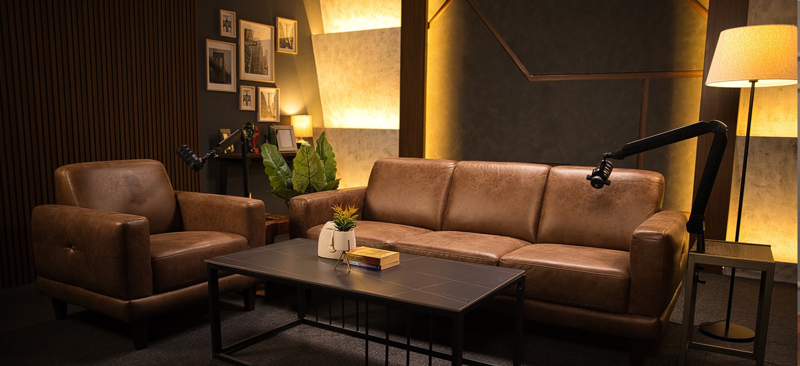 Sofa and armchair setup at Studio One