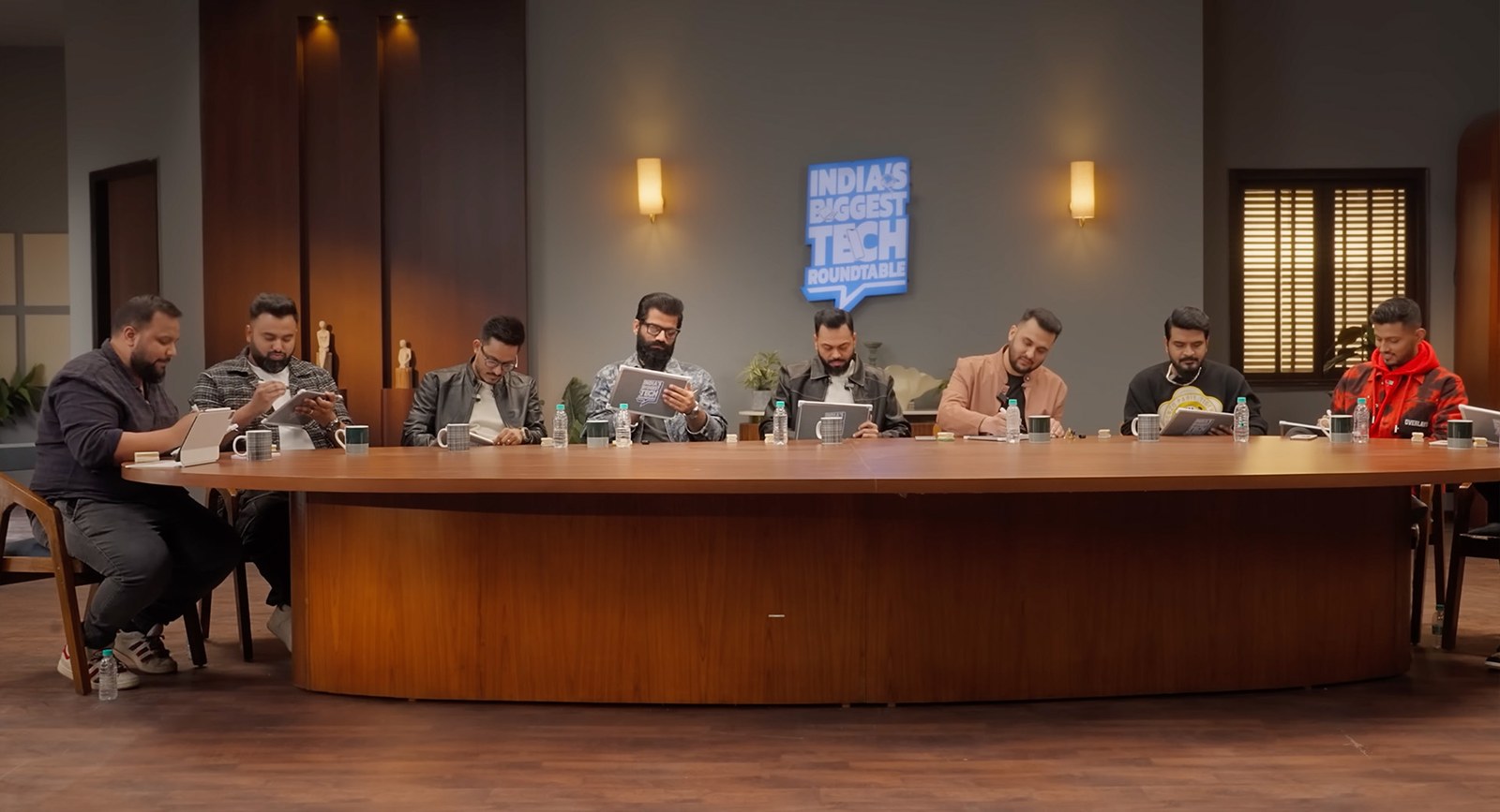 Eight-seat round table setup for a panel recording